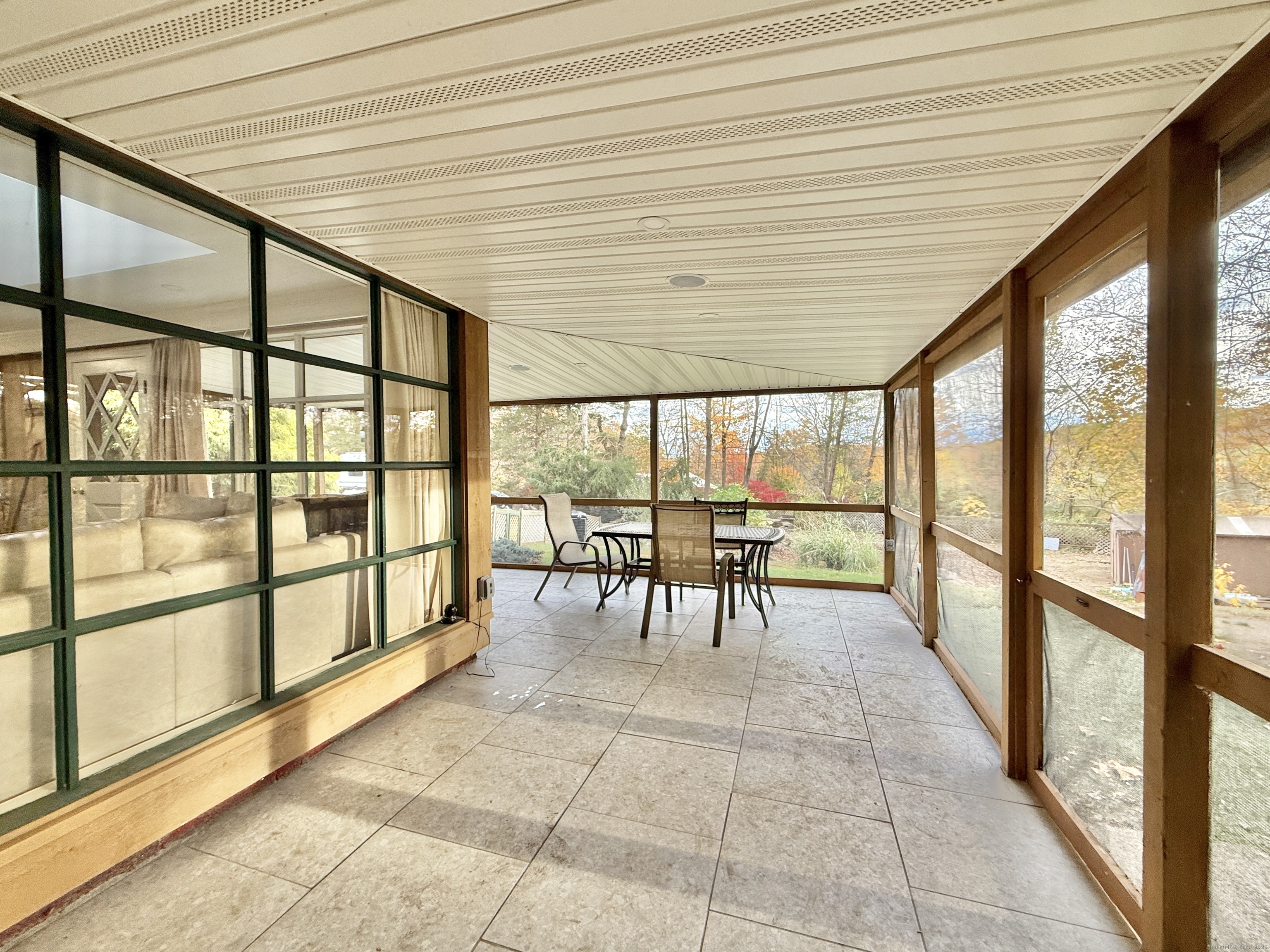 148 Bungay Road Seymour, CT 06483 - Photo 17 of 20 a view of an empty room with furniture and a large window