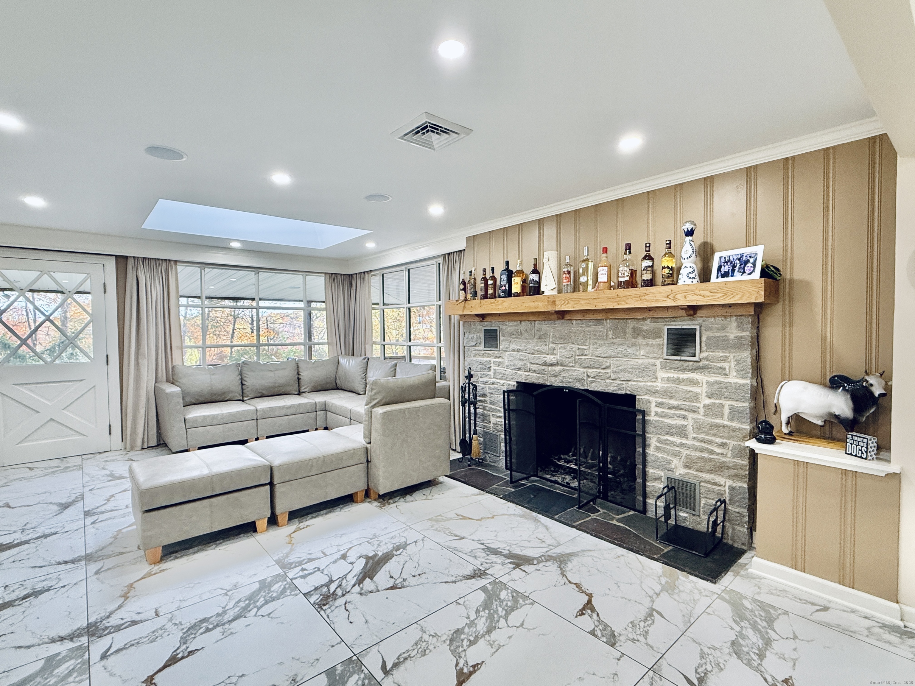 148 Bungay Road Seymour, CT 06483 - Photo 4 of 20 a living room with furniture and a fireplace