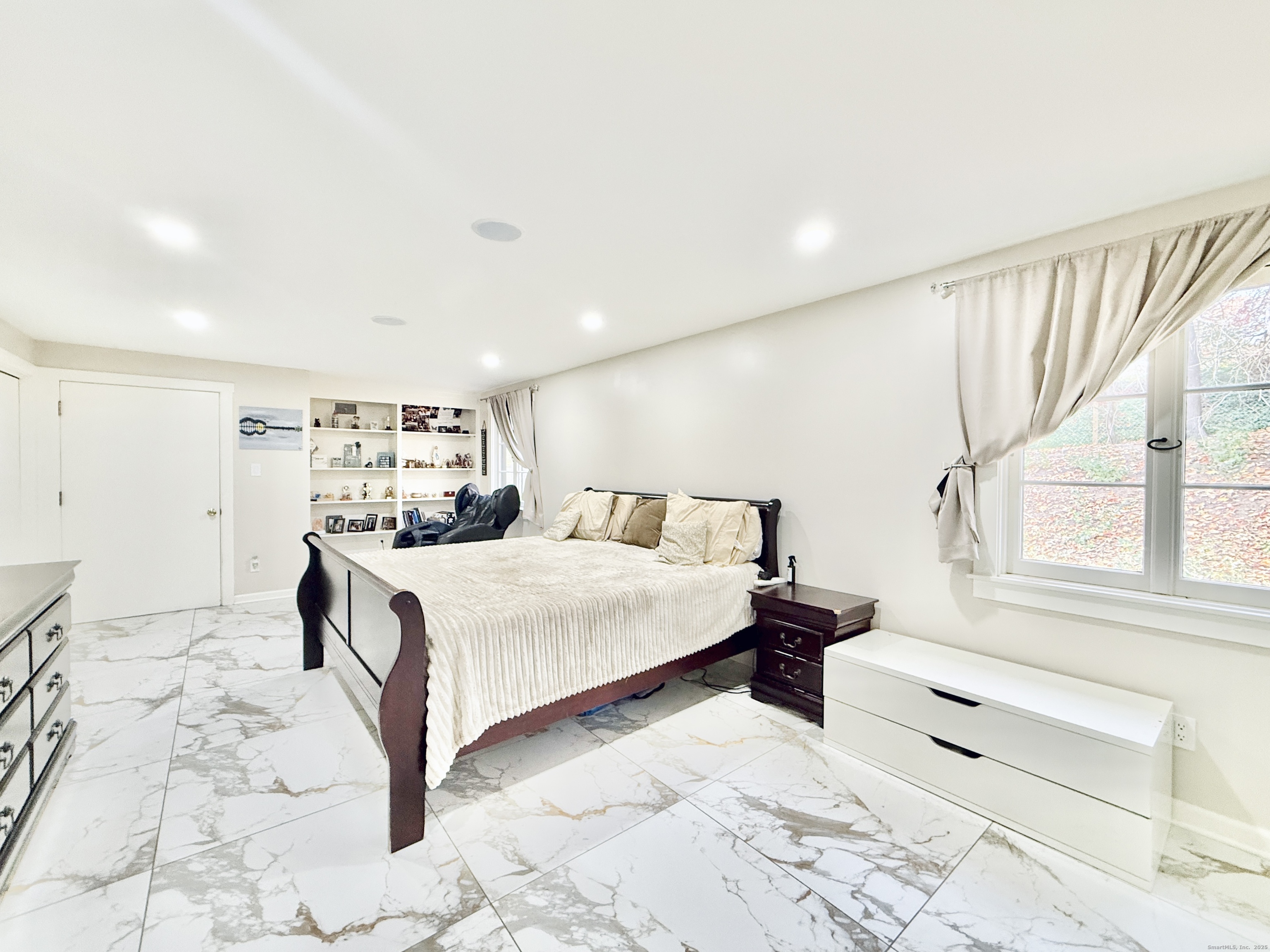 148 Bungay Road Seymour, CT 06483 - Photo 10 of 20 a bedroom with a bed and a large window