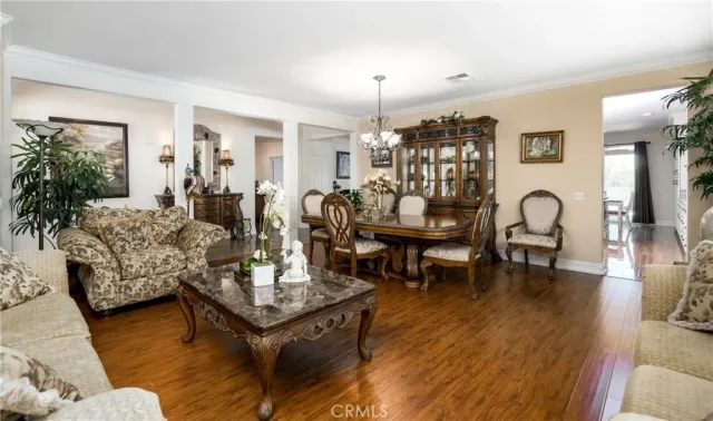a kitchen with granite countertop a sink stove and cabinets