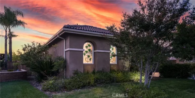 a view of a livingroom with furniture and hardwood floor