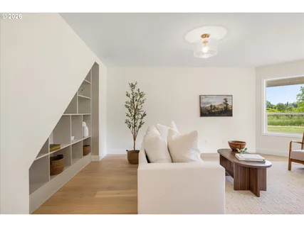 a living room with furniture and window