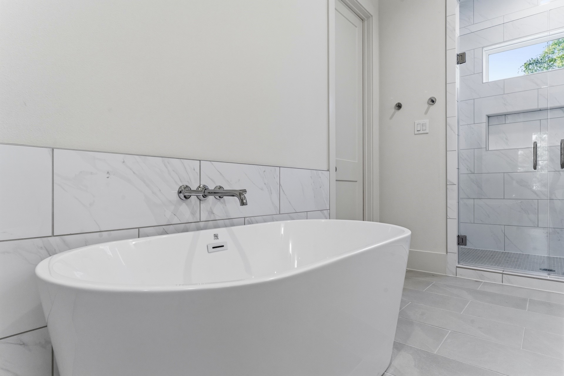 5317 Lambeth Riverside Drive Houston, TX 77091 - Photo 11 of 28 Magazine Worthy – No detail left behind, timeless design, upscale features, this exquisite
owner's bath is Joy to behold with freestanding soaking & tub frameless shower attached to
his/hers closet making your morning routine a breeze.