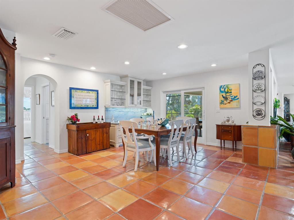 3300 Casey Key Road Nokomis, FL 34275 - Photo 11 of 65 a large dining hall with stainless steel appliances lots of counter top space and furniture