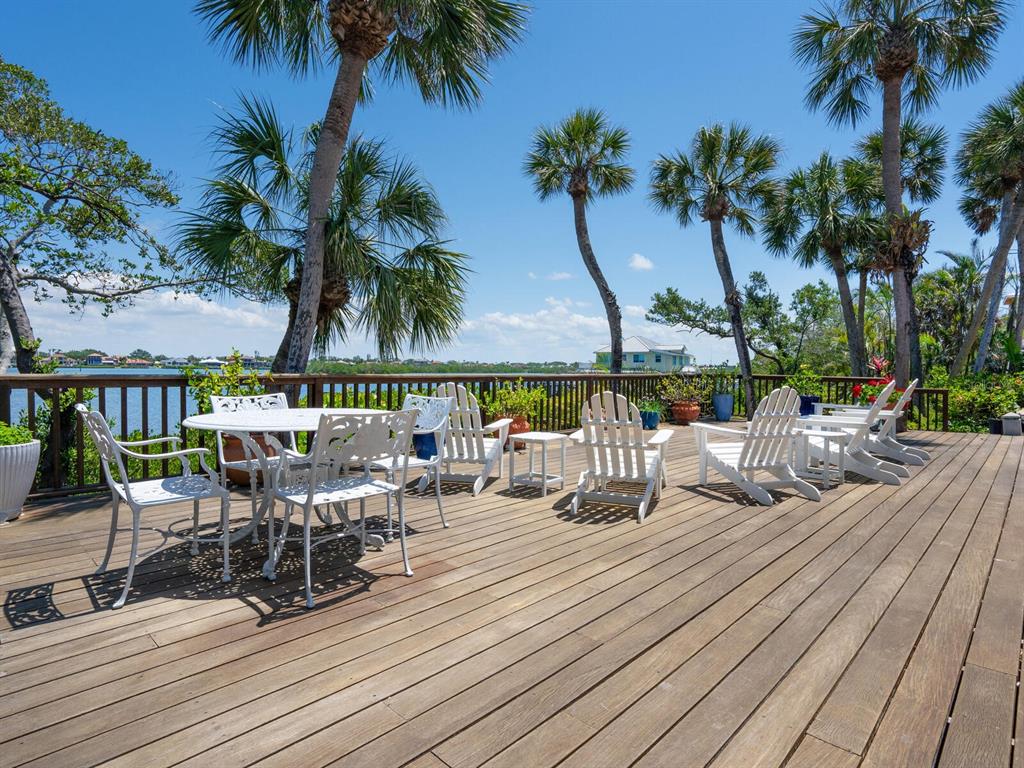 3300 Casey Key Road Nokomis, FL 34275 - Photo 37 of 65 a view of a swimming pool with furniture