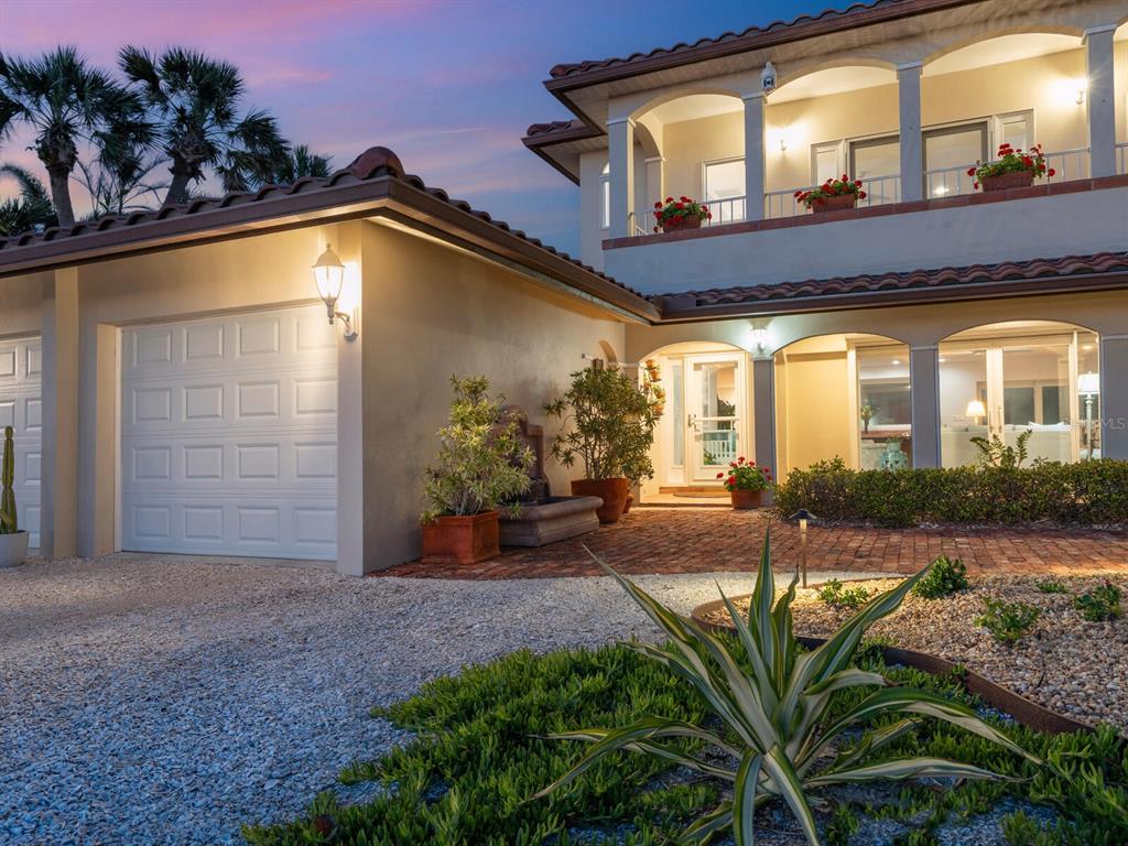 3300 Casey Key Road Nokomis, FL 34275 - Photo 48 of 65 a view of a house with a patio