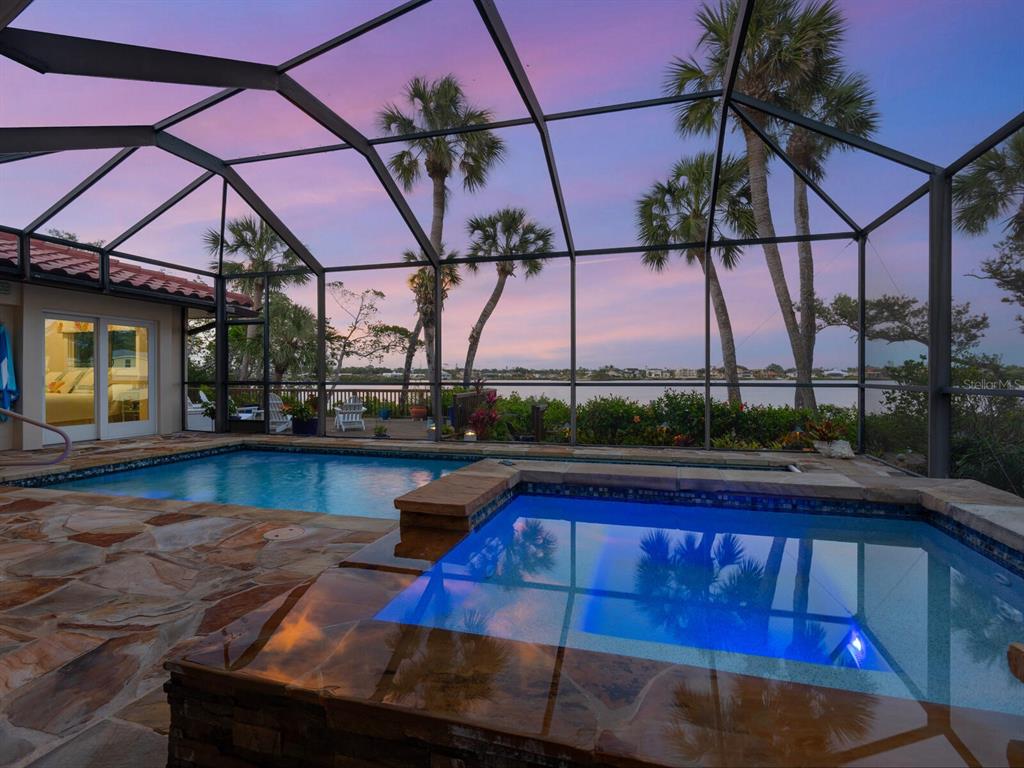 3300 Casey Key Road Nokomis, FL 34275 - Photo 56 of 65 a view of swimming pool with outdoor seating