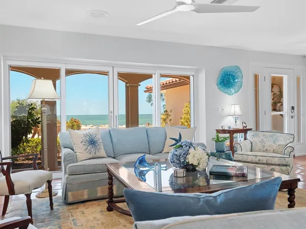 a living room with furniture and a rug