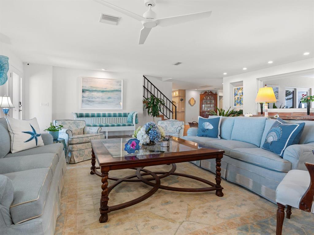 3300 Casey Key Road Nokomis, FL 34275 - Photo 8 of 65 a living room with furniture and a rug