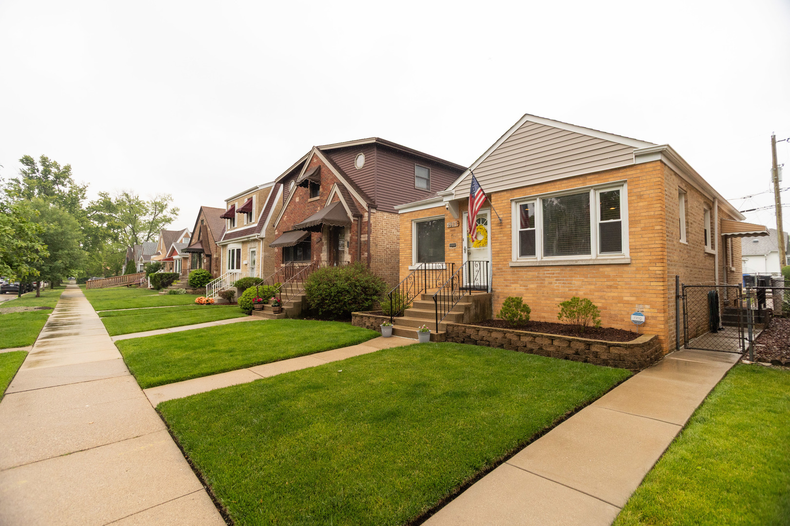 5328 North Rutherford Avenue Chicago, IL 60656 - Photo 3 of 40 a front view of a house with a yard
