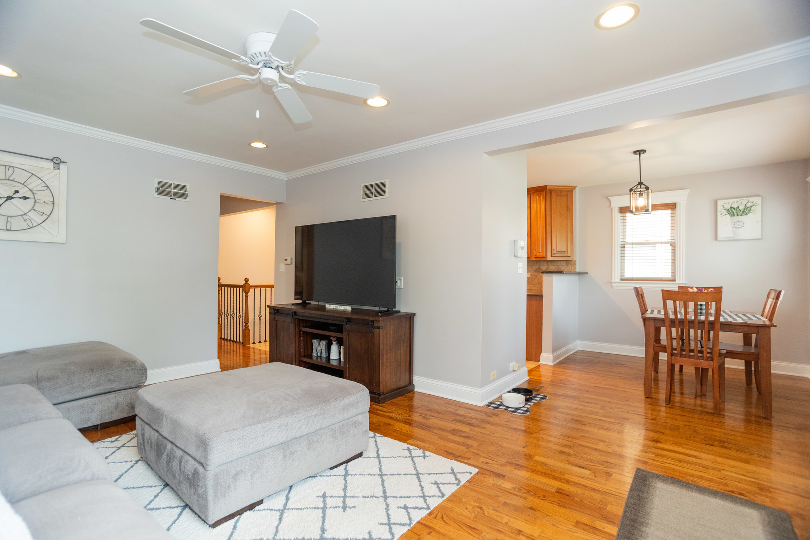 5328 North Rutherford Avenue Chicago, IL 60656 - Photo 4 of 40 a bedroom with furniture and a flat screen tv