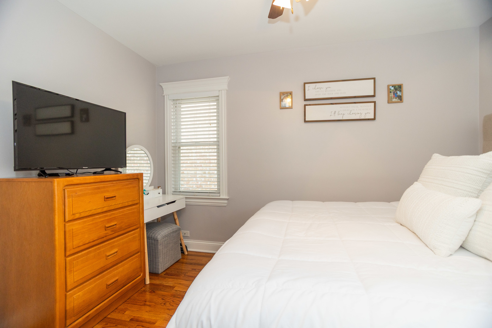 5328 North Rutherford Avenue Chicago, IL 60656 - Photo 7 of 40 a bedroom with a bed and flat screen tv