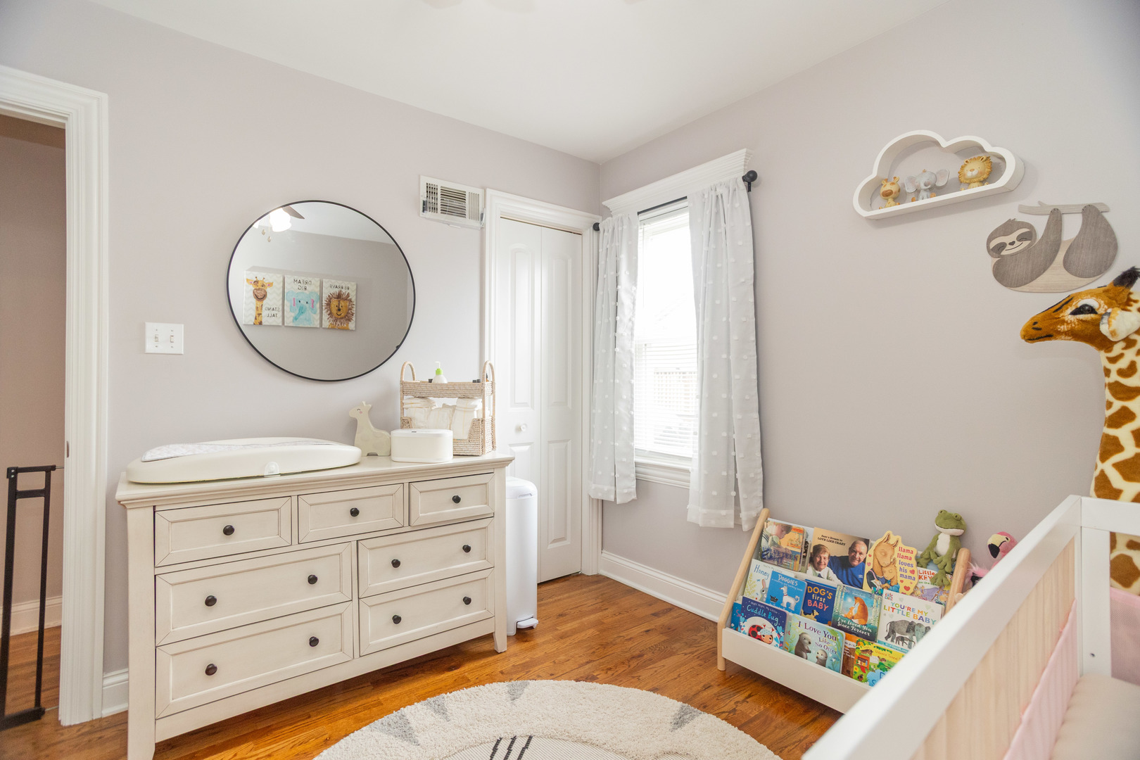 5328 North Rutherford Avenue Chicago, IL 60656 - Photo 10 of 40 a bed room with a bed and a dresser in it
