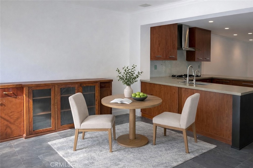 4 Del Rey, Unit 19 Irvine, CA 92612 - Photo 12 of 25 AI GENERATED STAGED FOR EAT IN KITCHEN AREA!