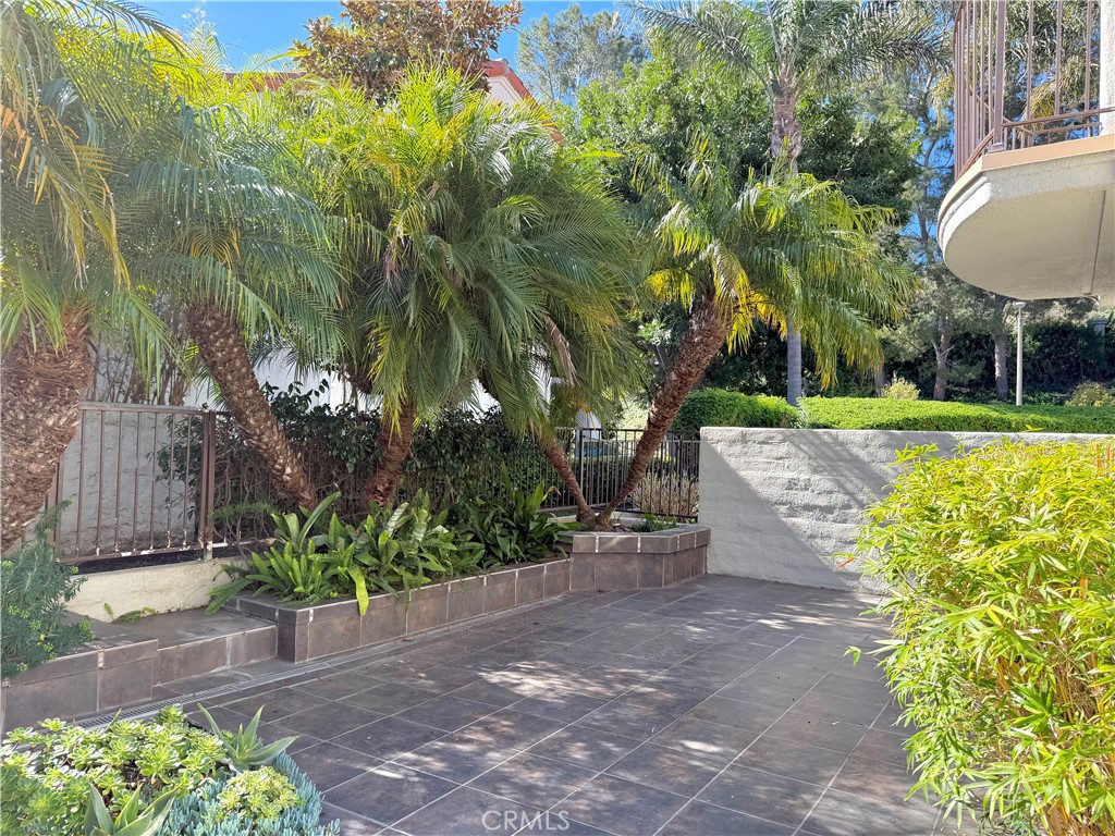 4 Del Rey, Unit 19 Irvine, CA 92612 - Photo 21 of 25 SERENE BEAUTIFULLY TILED BACKYARD AREA!