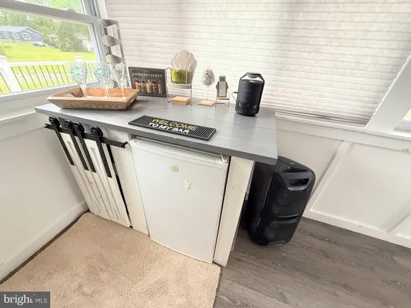 a view of workspace with wooden floor