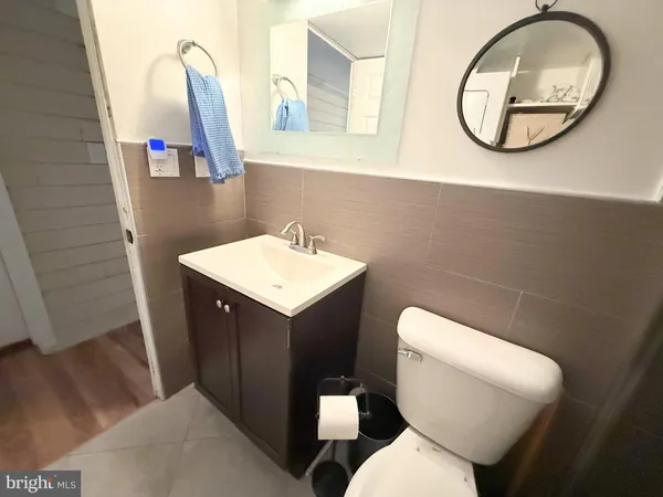 a bathroom with a toilet and a sink