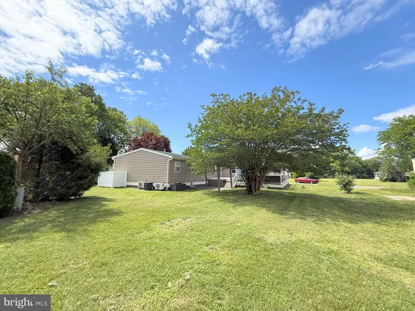 a fire hydrant in the middle of a field