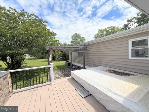 a view of house with yard