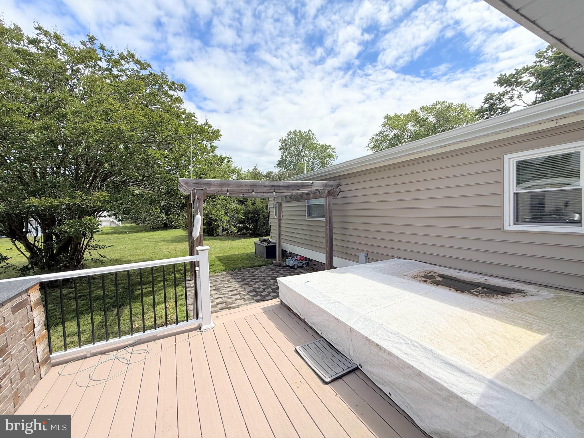 34635 Deck Street, Unit E323 Long Neck, DE 19966 - Photo 10 of 44 a view of house with yard