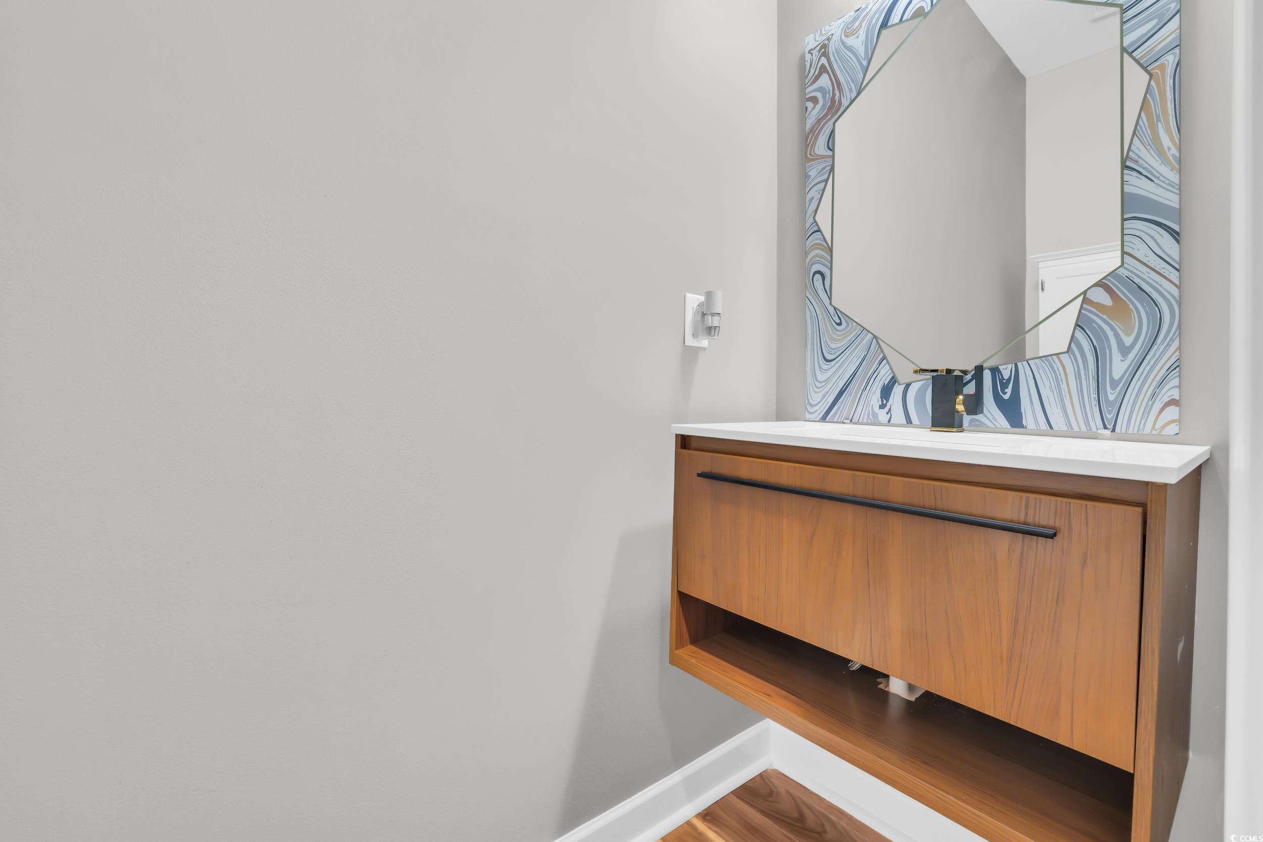 1705 Brookshade Court Conway, SC 29526 - Photo 17 of 40 Bathroom with vanity and baseboards