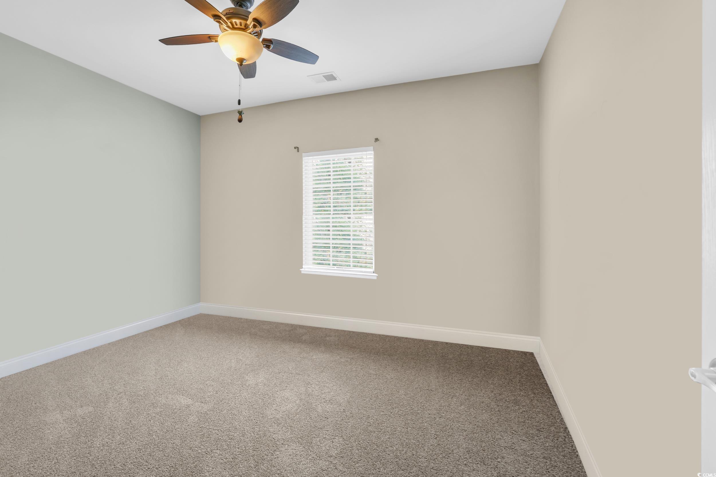1705 Brookshade Court Conway, SC 29526 - Photo 24 of 40 Carpeted empty room with baseboards and a ceiling fan