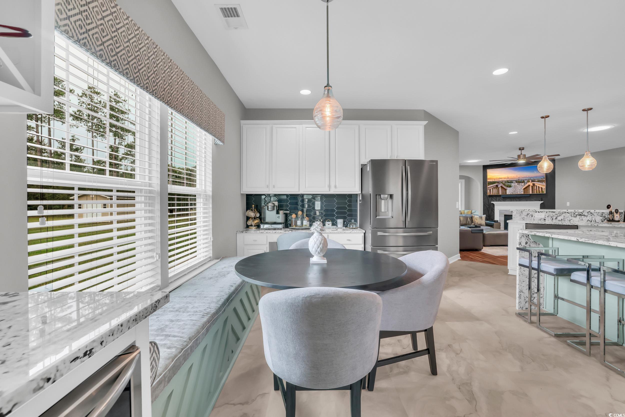 1705 Brookshade Court Conway, SC 29526 - Photo 7 of 40 Dining room with recessed lighting and a fireplace