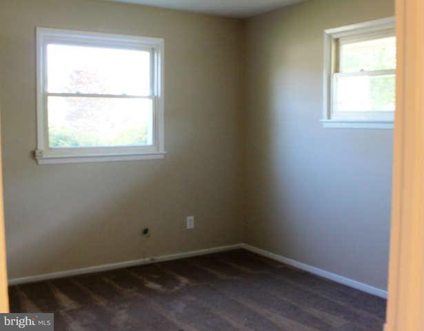 5221 Montgomery Street Springfield, VA 22151 - Photo 10 of 16 an empty room with a window
