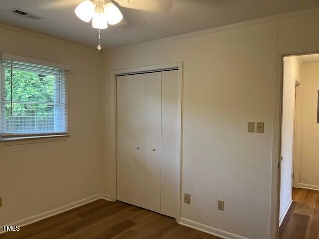 168 West Braxton Foushee Street, Unit 6 Carrboro, NC 27510 - Photo 11 of 14 wooden floor in an empty room with a window