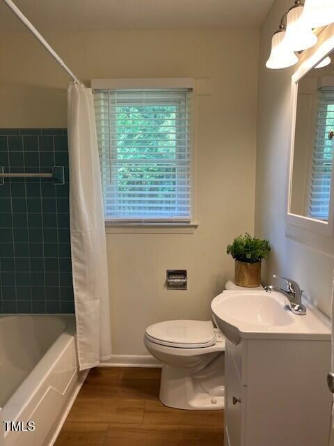168 West Braxton Foushee Street, Unit 6 Carrboro, NC 27510 - Photo 12 of 14 a bathroom with a sink toilet and bathtub