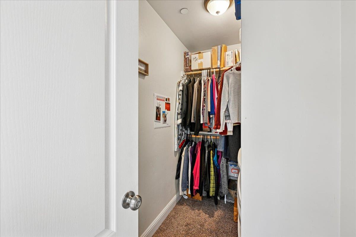 21895 One Fine Place Colfax, CA 95713 - Photo 45 of 82 a view of walk in closet with clothes
