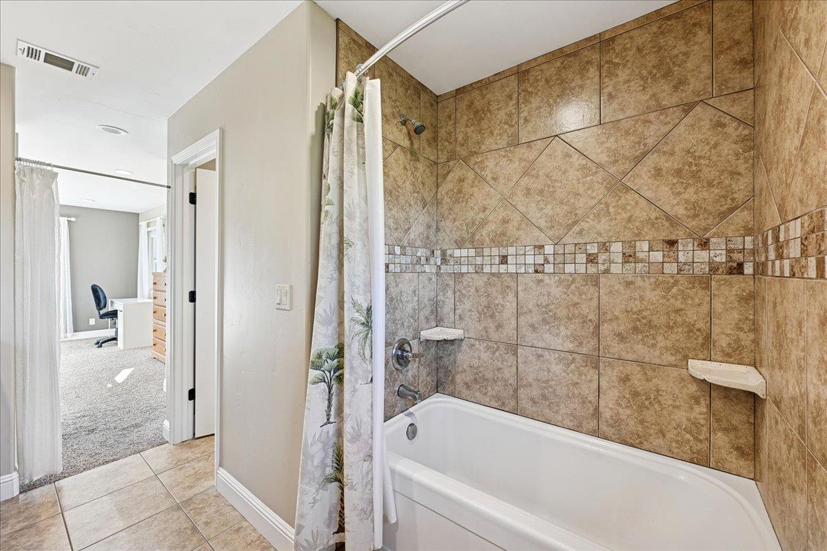 21895 One Fine Place Colfax, CA 95713 - Photo 47 of 82 a bathroom with a bathtub and shower