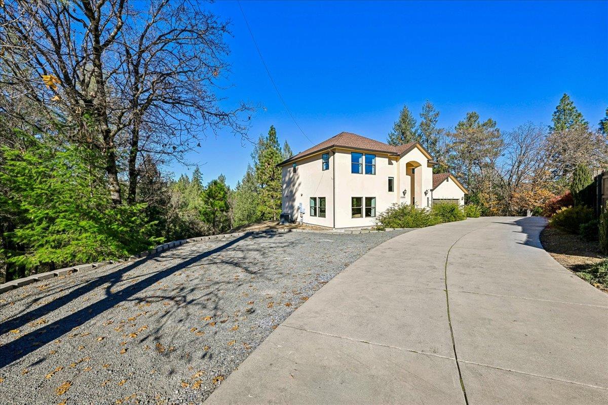 21895 One Fine Place Colfax, CA 95713 - Photo 55 of 82 a view of a white house with a yard