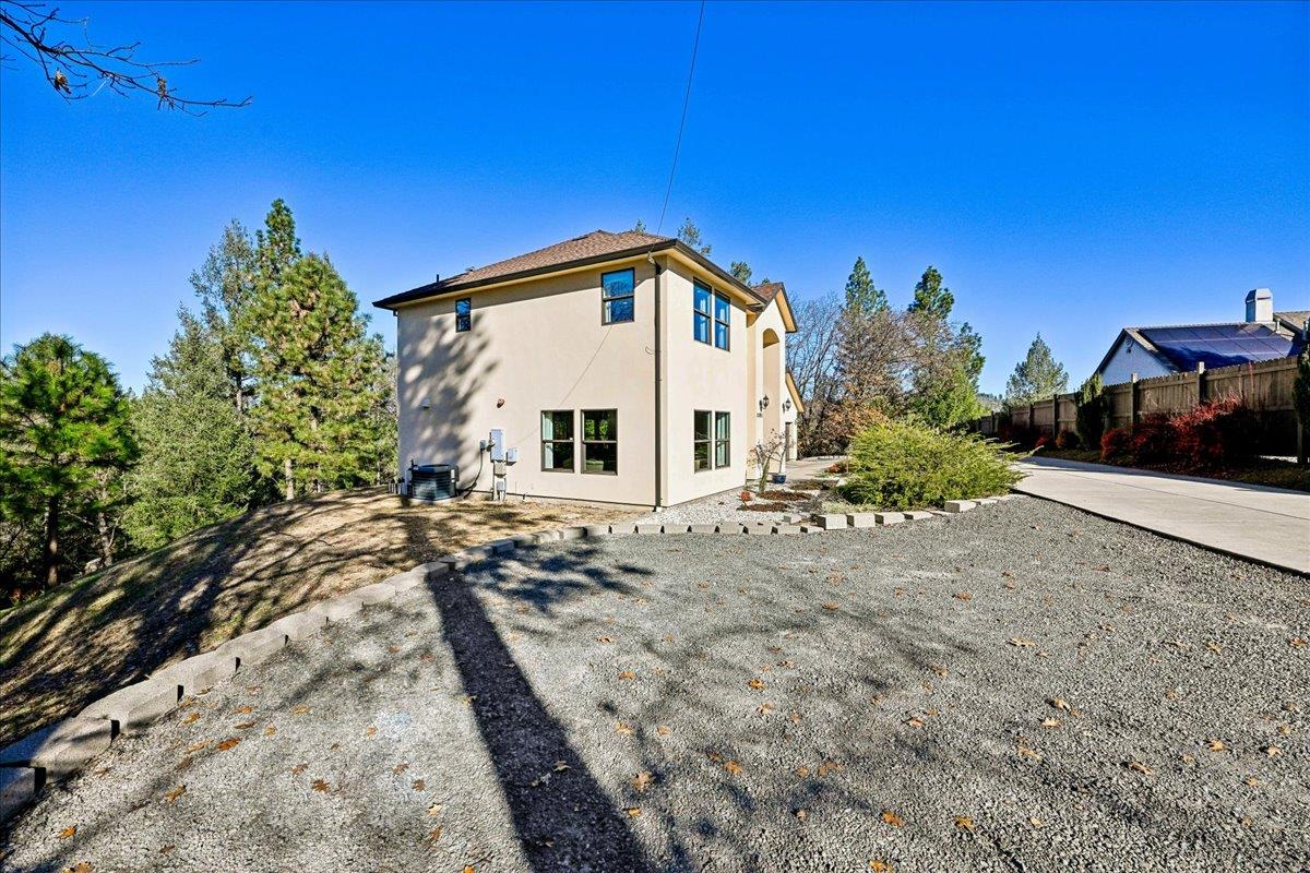 21895 One Fine Place Colfax, CA 95713 - Photo 56 of 82 a view of a house with backyard and trees