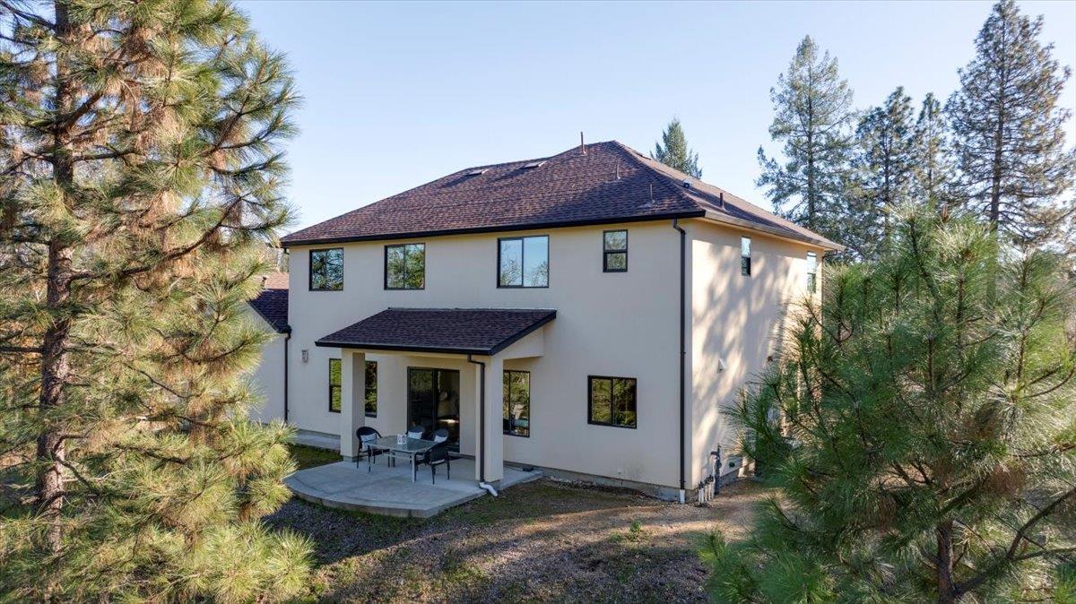 21895 One Fine Place Colfax, CA 95713 - Photo 72 of 81 a view of a house with a yard patio and a garden