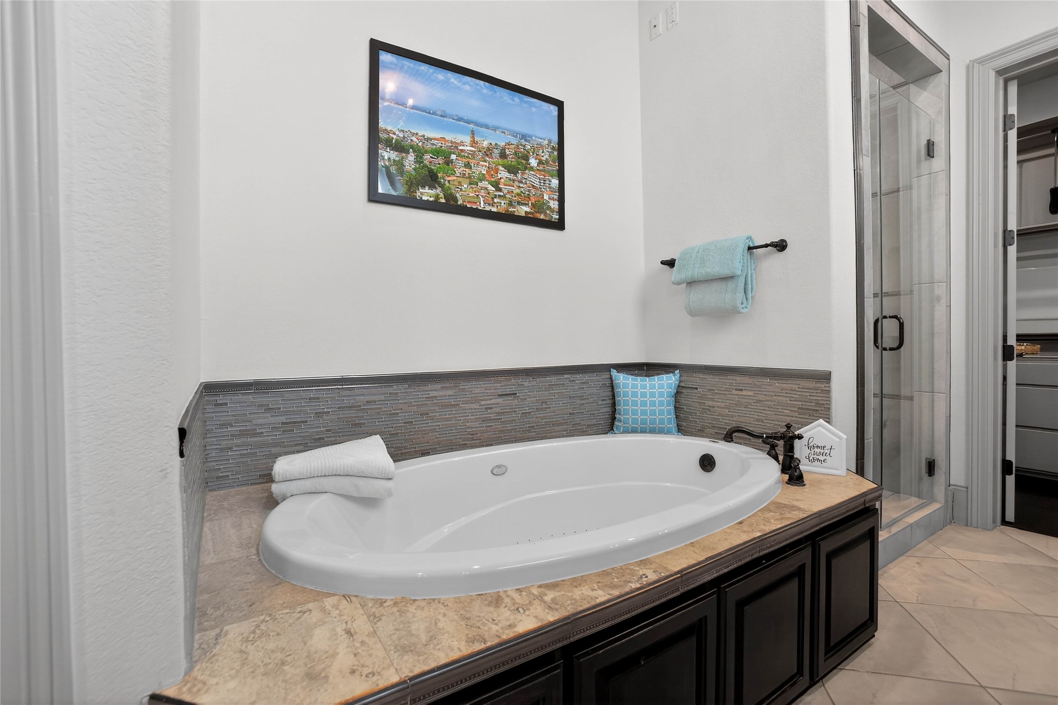 12349 Tramonto Conroe, TX 77304 - Photo 22 of 50 a bathroom with a sink and a mirror