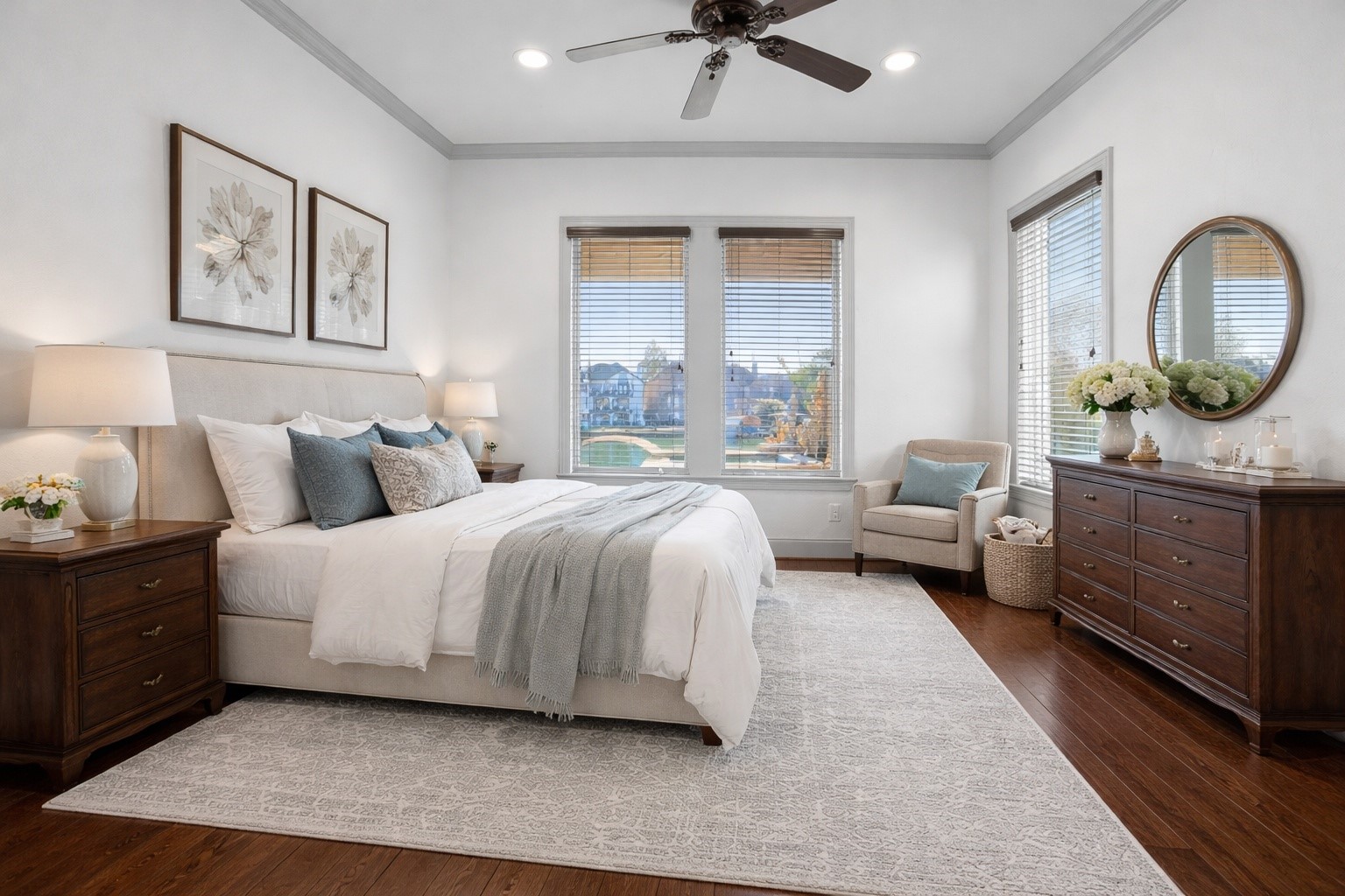 12349 Tramonto Conroe, TX 77304 - Photo 32 of 50 Guest bedroom on the first loor is spacious and elegantly designed. It has ample natural light from two windows. The room is complemented by wooden flooring and a great lake view.