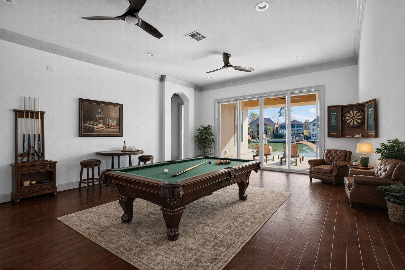 12349 Tramonto Conroe, TX 77304 - Photo 39 of 50 a living room with furniture pool table and a large window