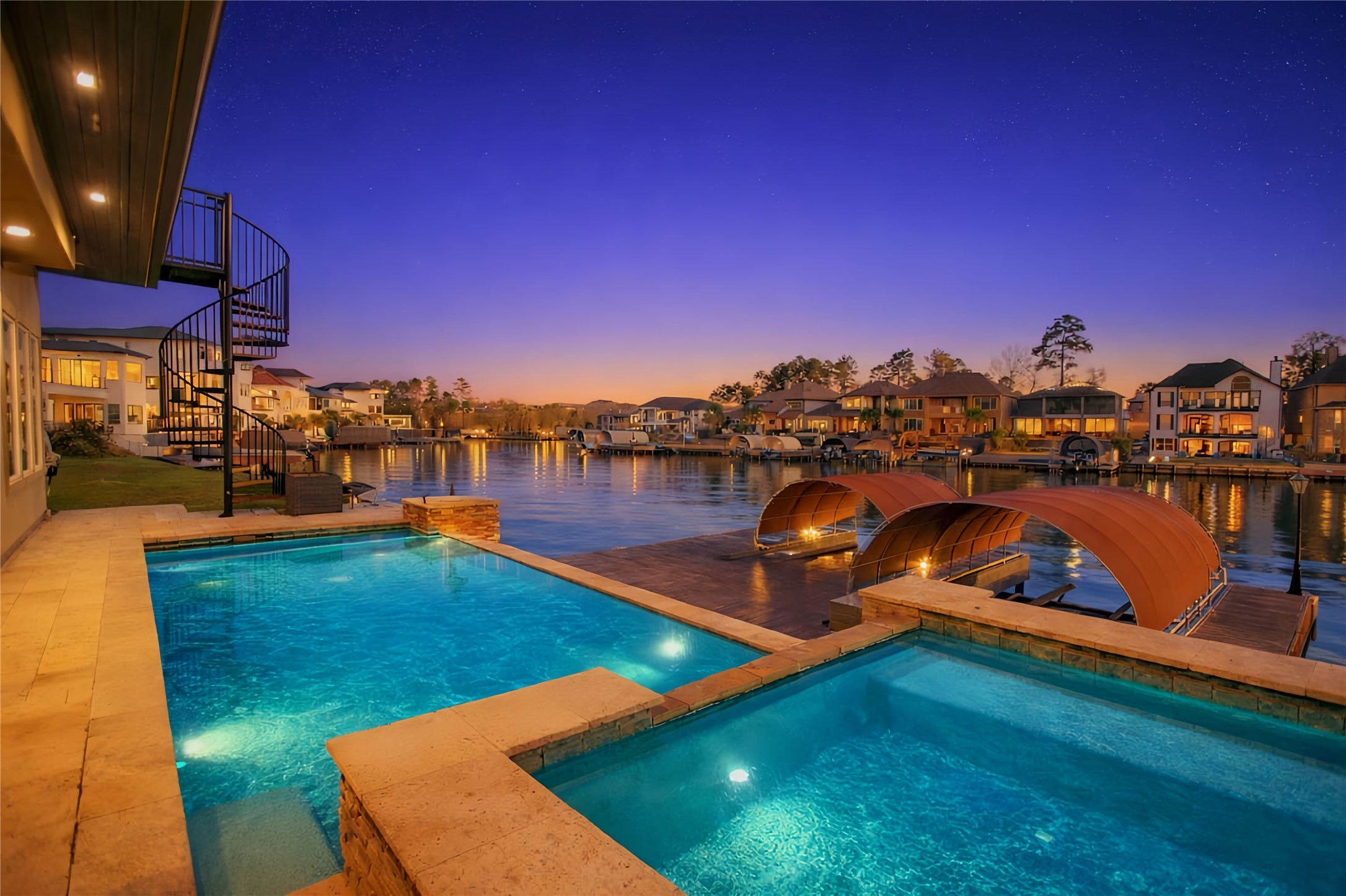 12349 Tramonto Conroe, TX 77304 - Photo 5 of 50 Another view of the tranquility pool and the SPA, overlooking Lake Conroe area.
