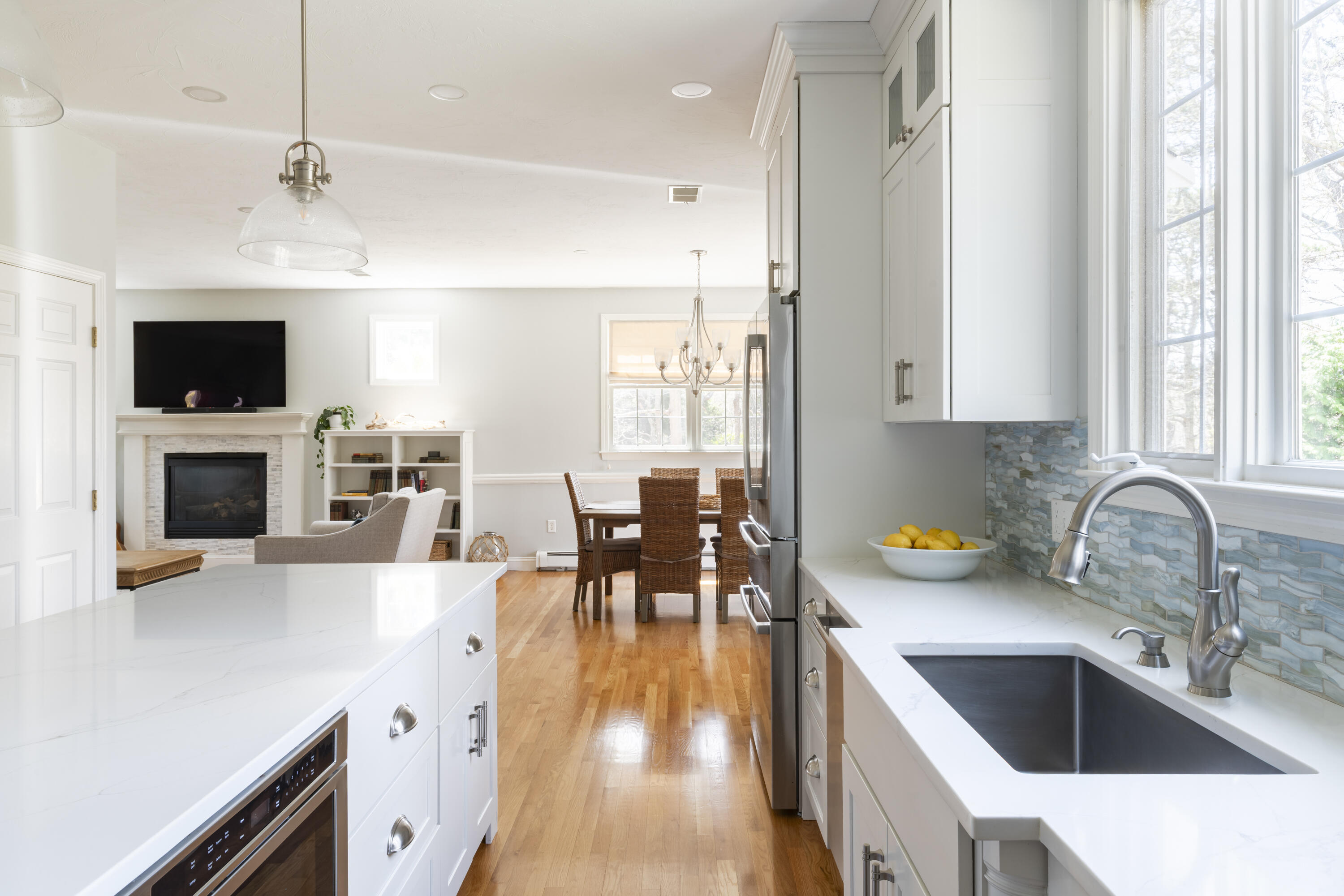 331 Riverview Drive Chatham, MA 02633 - Photo 16 of 50 a kitchen with granite countertop a sink a counter top space appliances and cabinets