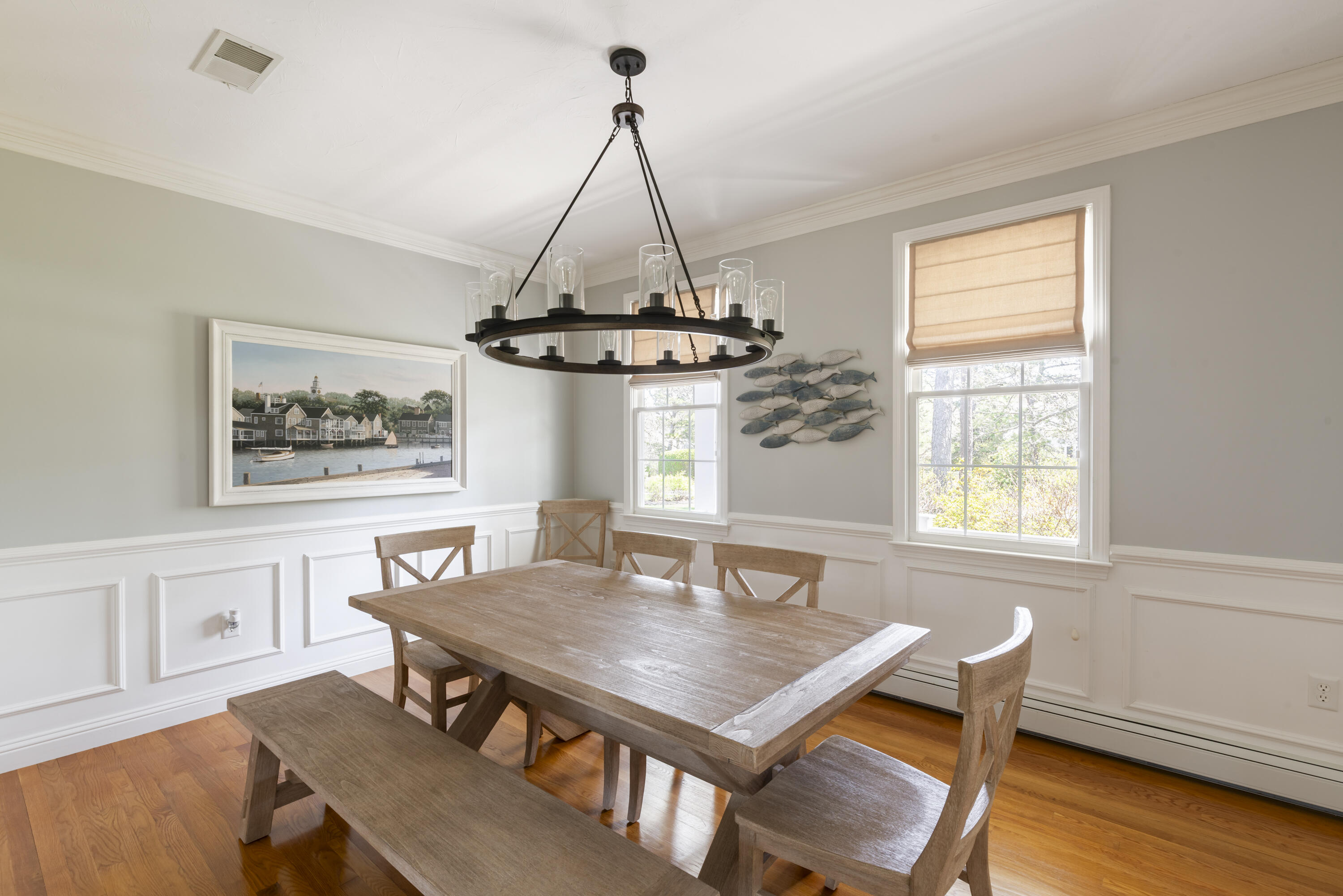 331 Riverview Drive Chatham, MA 02633 - Photo 19 of 50 a view of a dining room with furniture window and wooden floor
