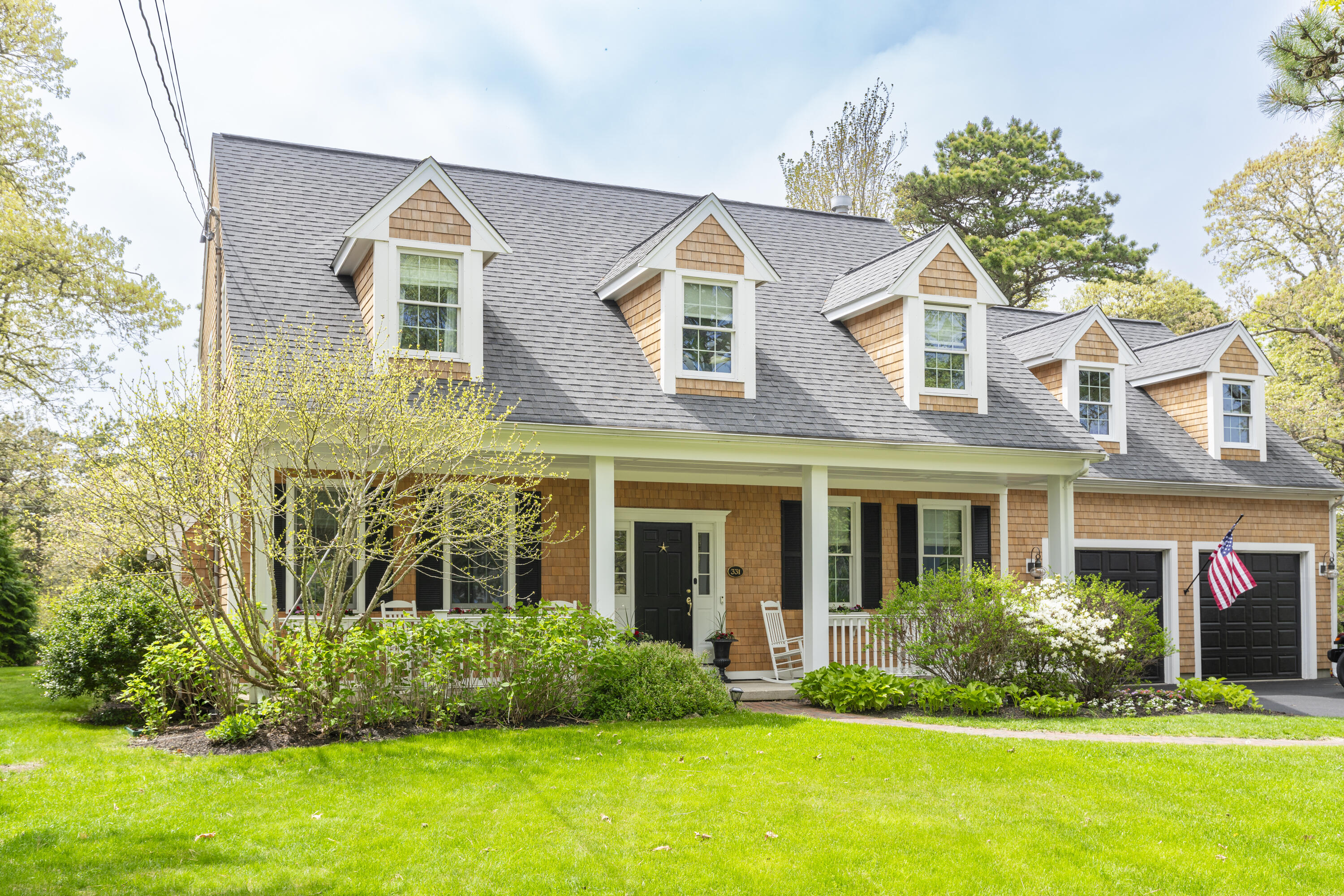 331 Riverview Drive Chatham, MA 02633 - Photo 2 of 50 front view of a house with a yard