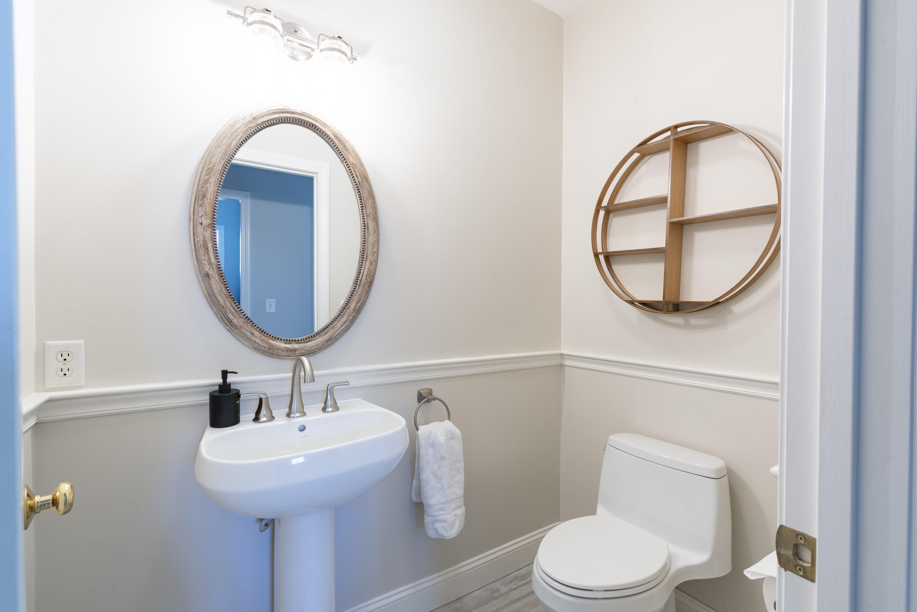 331 Riverview Drive Chatham, MA 02633 - Photo 23 of 50 a bathroom with a sink and a mirror
