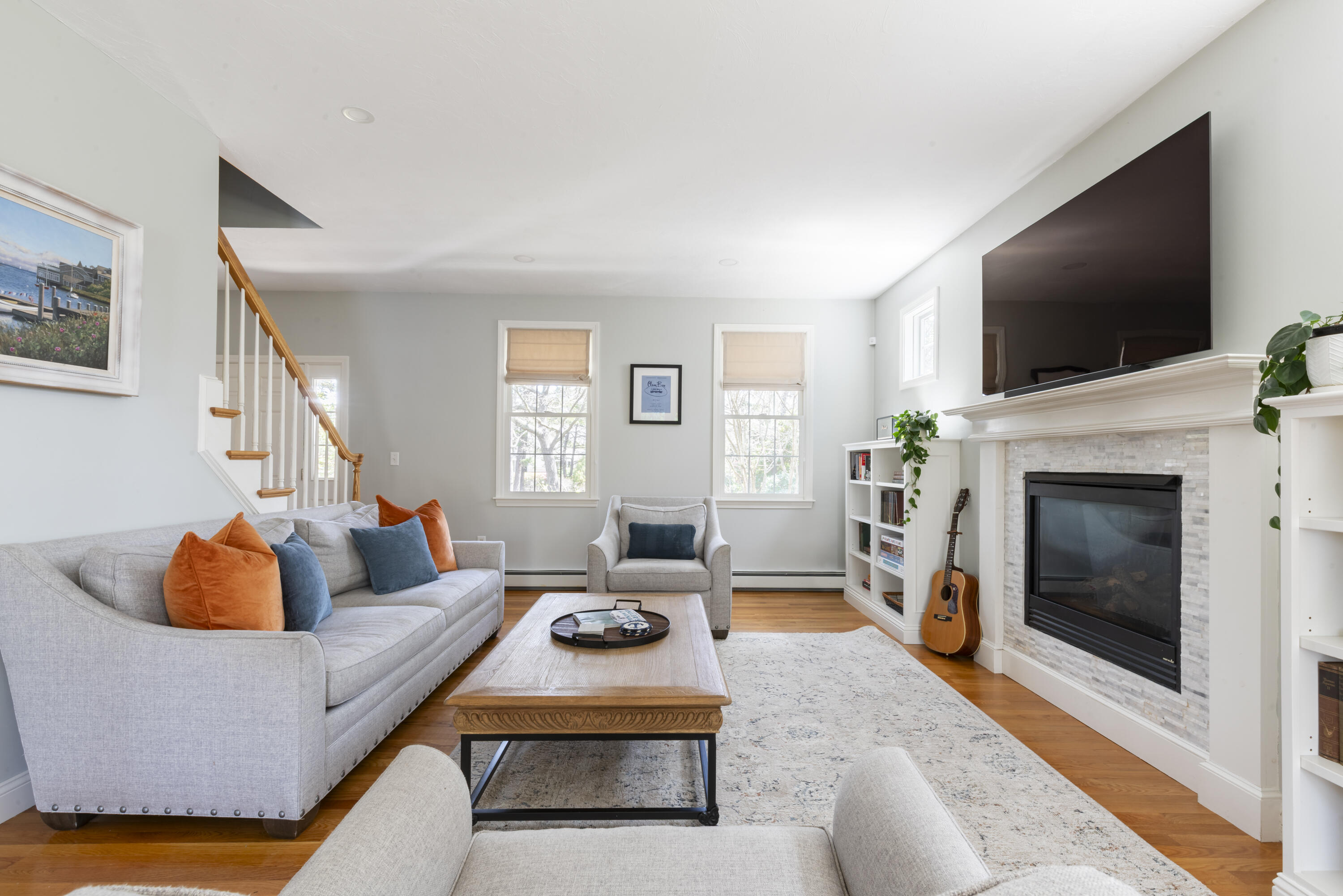 331 Riverview Drive Chatham, MA 02633 - Photo 27 of 50 a living room with furniture and a fireplace