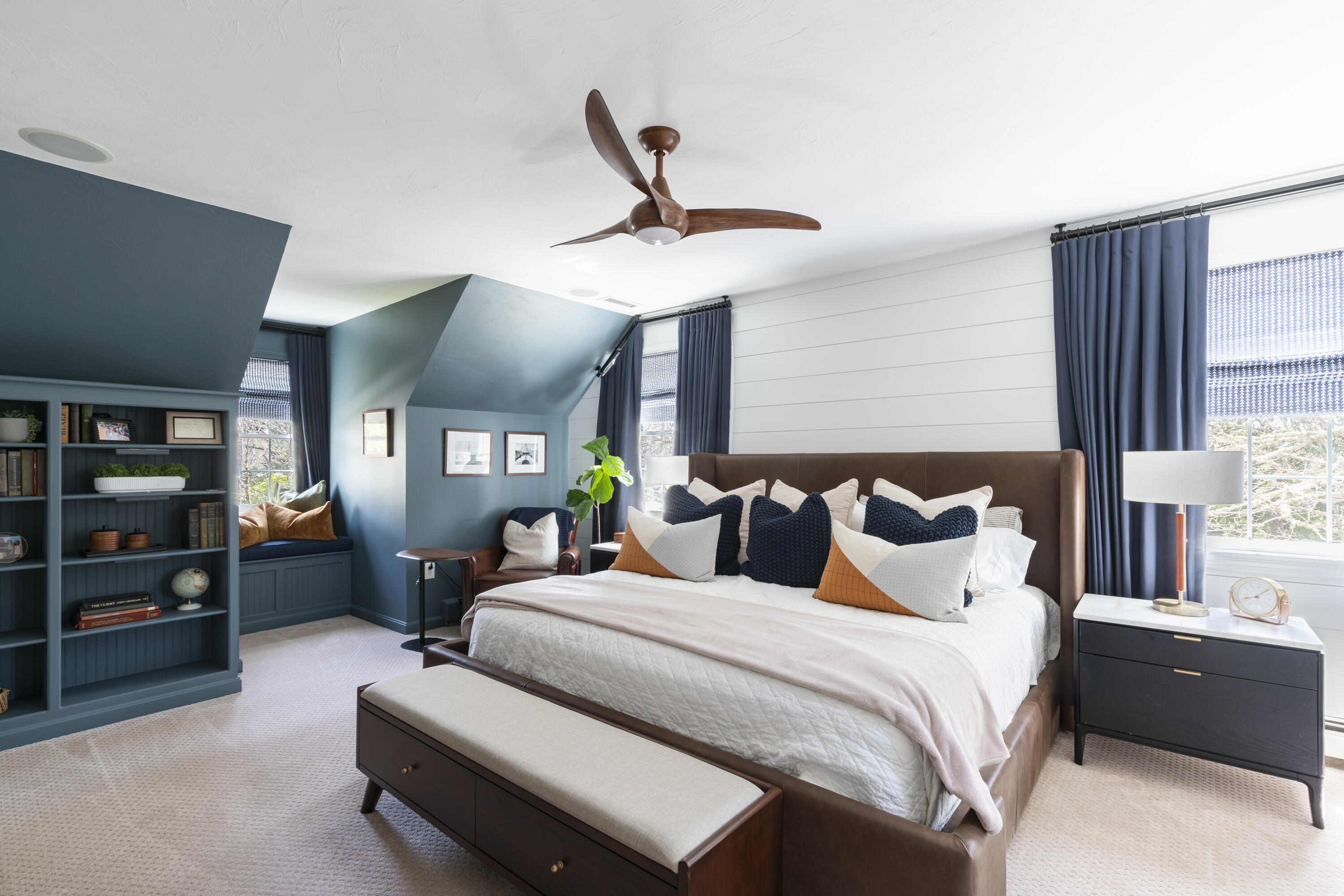 331 Riverview Drive Chatham, MA 02633 - Photo 31 of 50 a bedroom with a bed and a chandelier