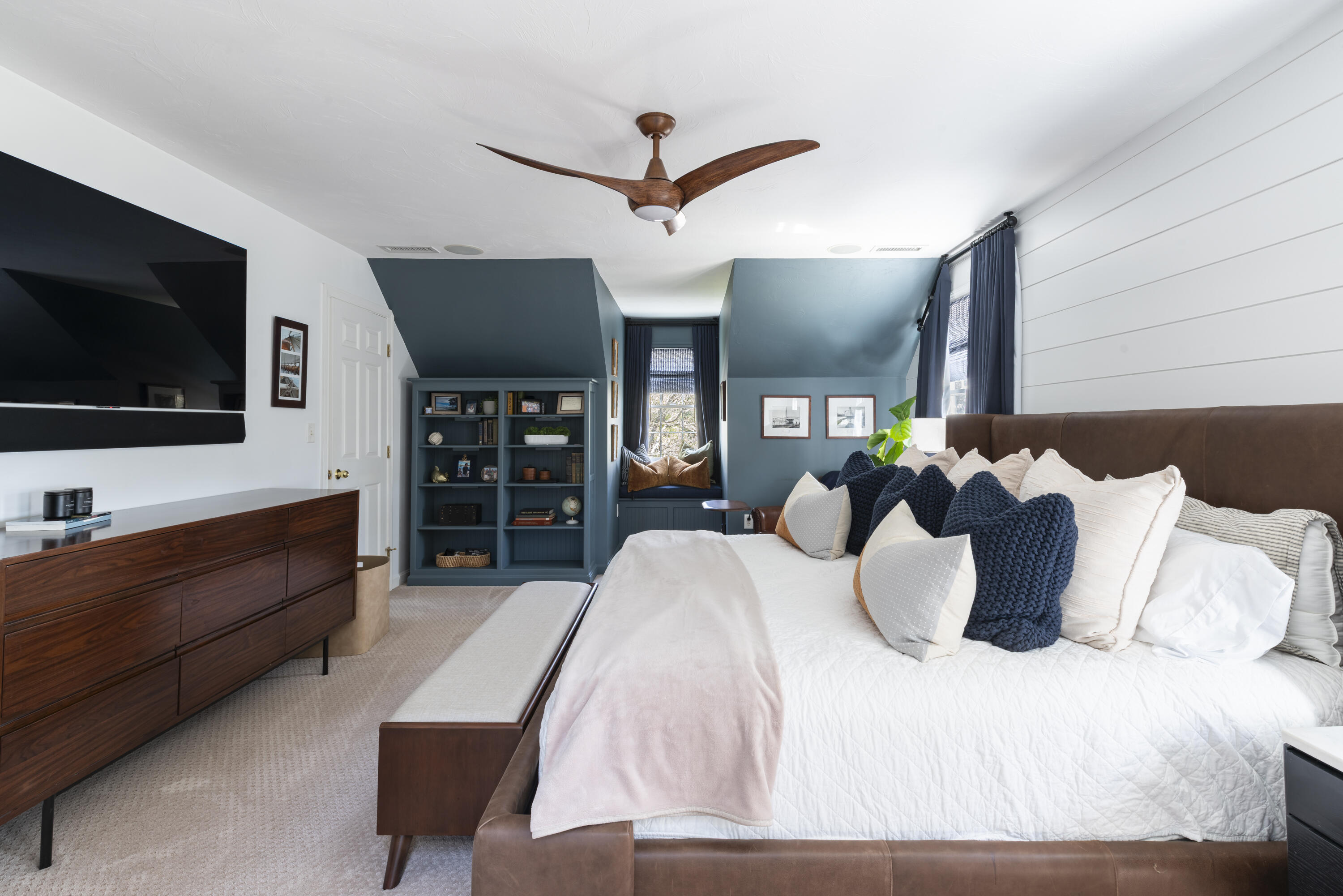 331 Riverview Drive Chatham, MA 02633 - Photo 32 of 50 a bedroom with a bed a flat screen tv and dresser