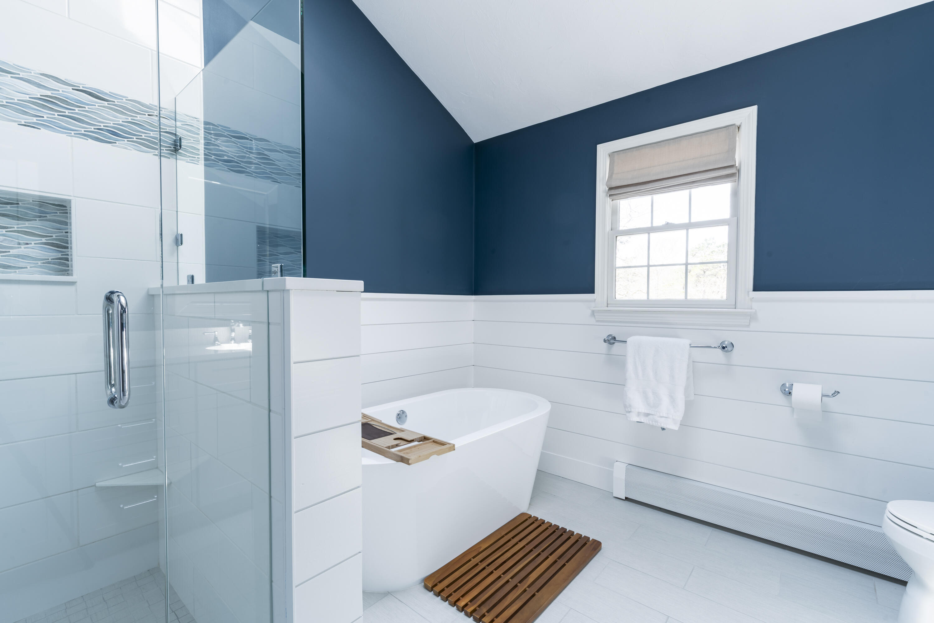 331 Riverview Drive Chatham, MA 02633 - Photo 33 of 50 a bathroom with a bathtub and shower