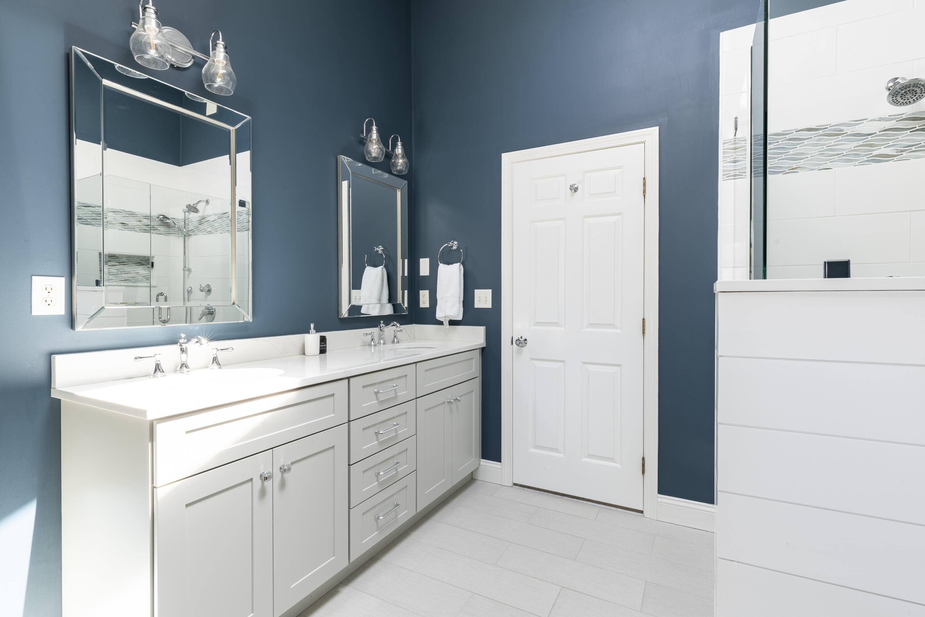 331 Riverview Drive Chatham, MA 02633 - Photo 35 of 50 a bathroom with a double vanity sink mirror and double