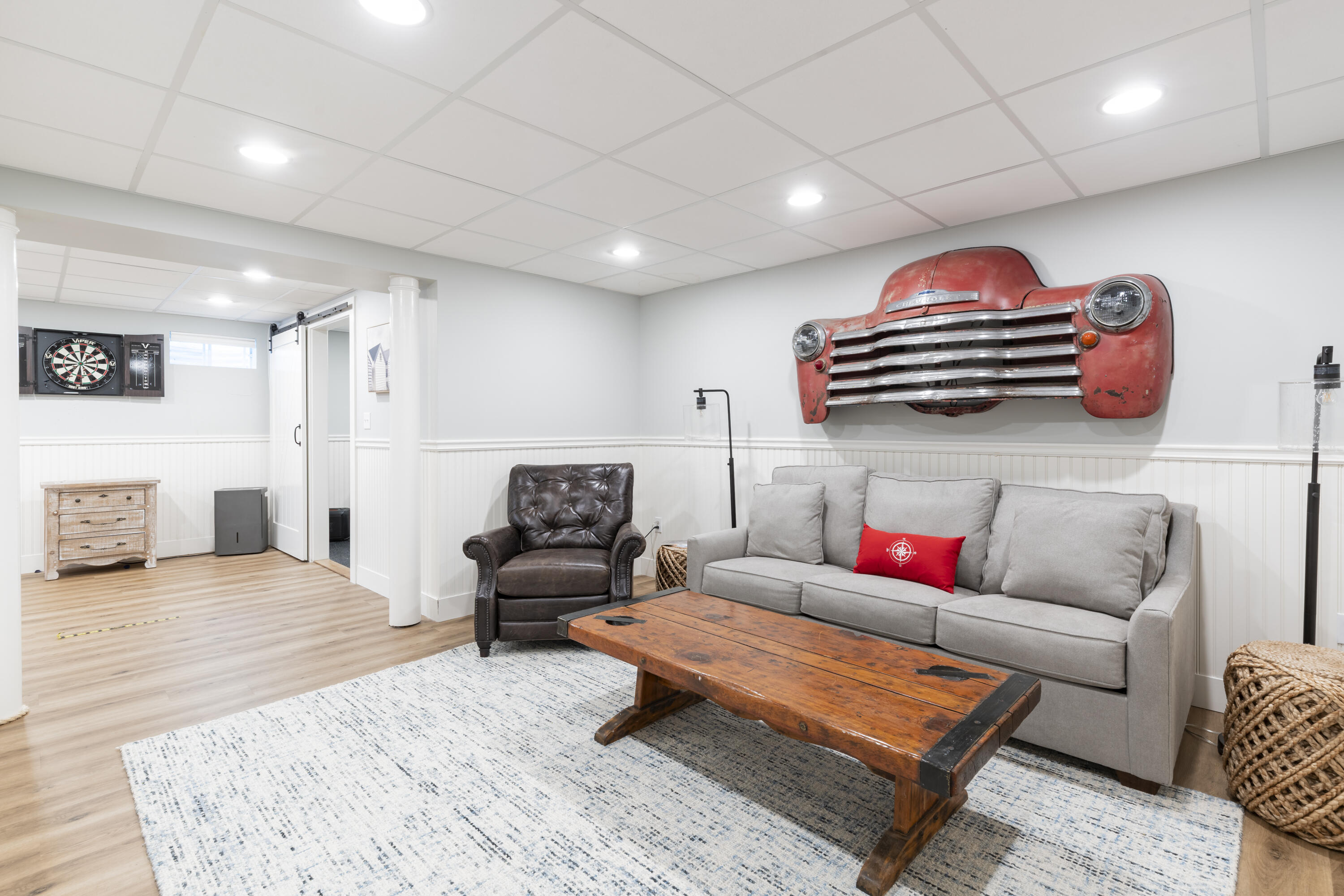 331 Riverview Drive Chatham, MA 02633 - Photo 40 of 50 a living room with furniture and a wooden floor