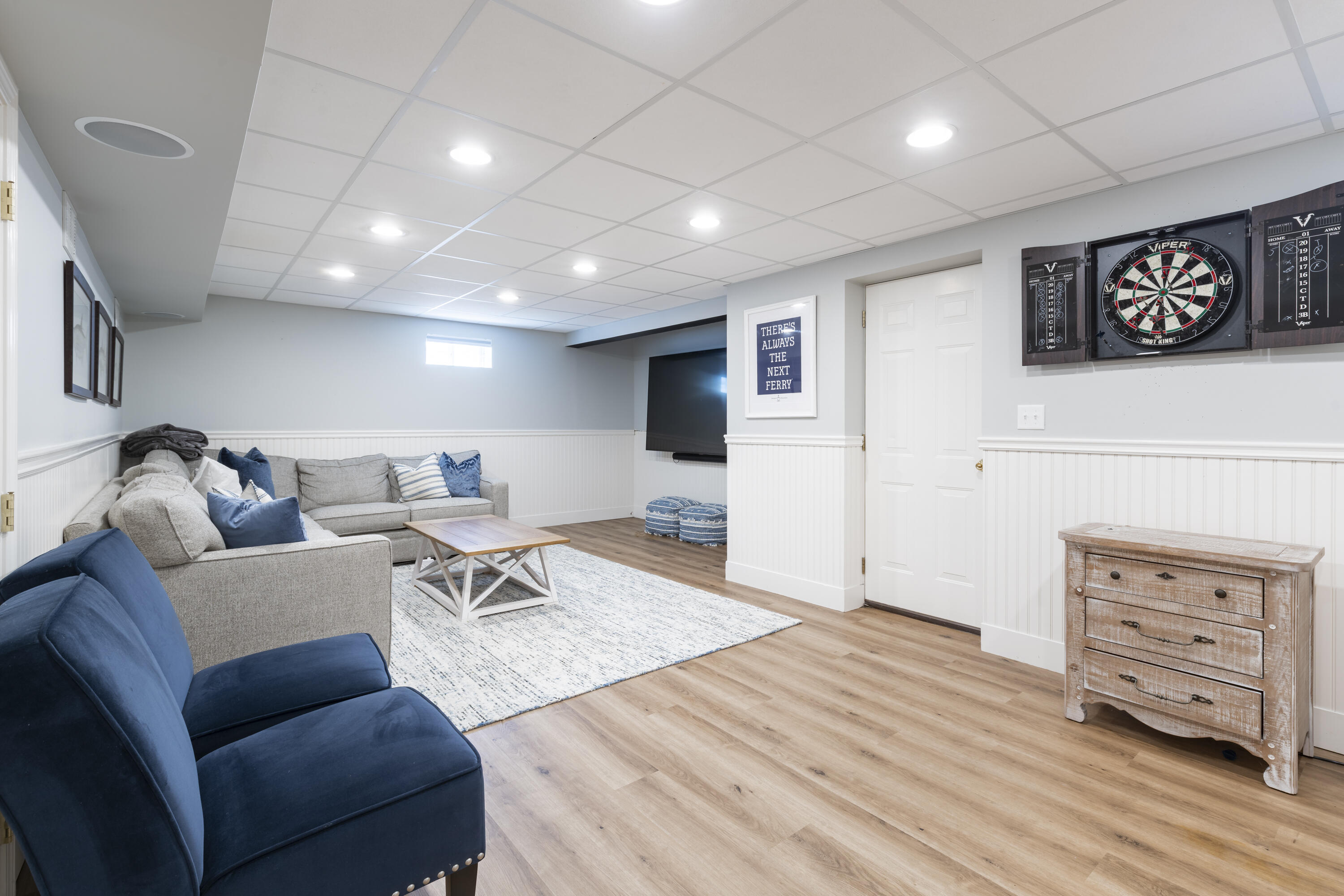 331 Riverview Drive Chatham, MA 02633 - Photo 42 of 50 a living room with furniture and a flat screen tv